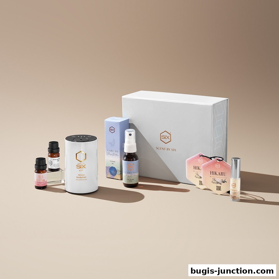 A collection of Scent by SIX aromatherapy products including an aroma revitalizer, essential oils, and pillow mists.