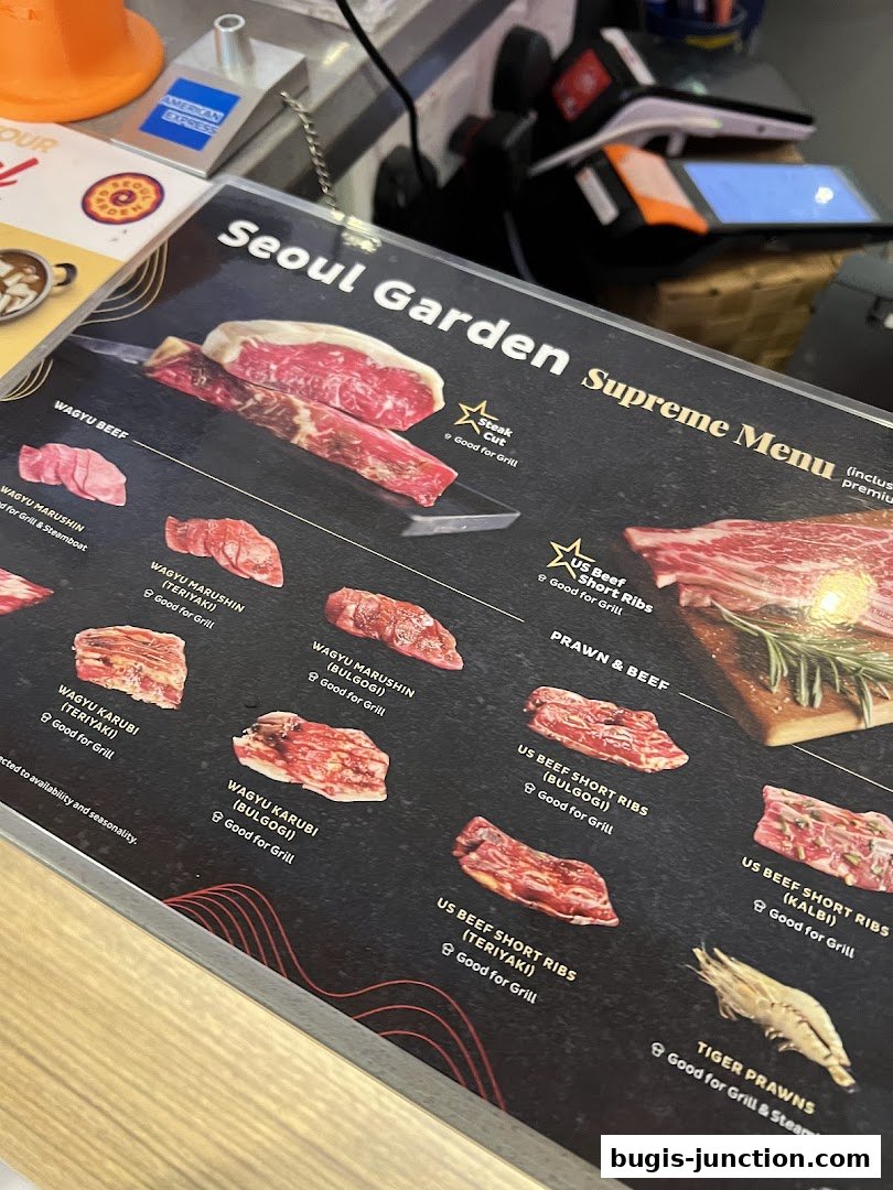 A menu from Seoul Garden featuring various cuts of beef and tiger prawns.