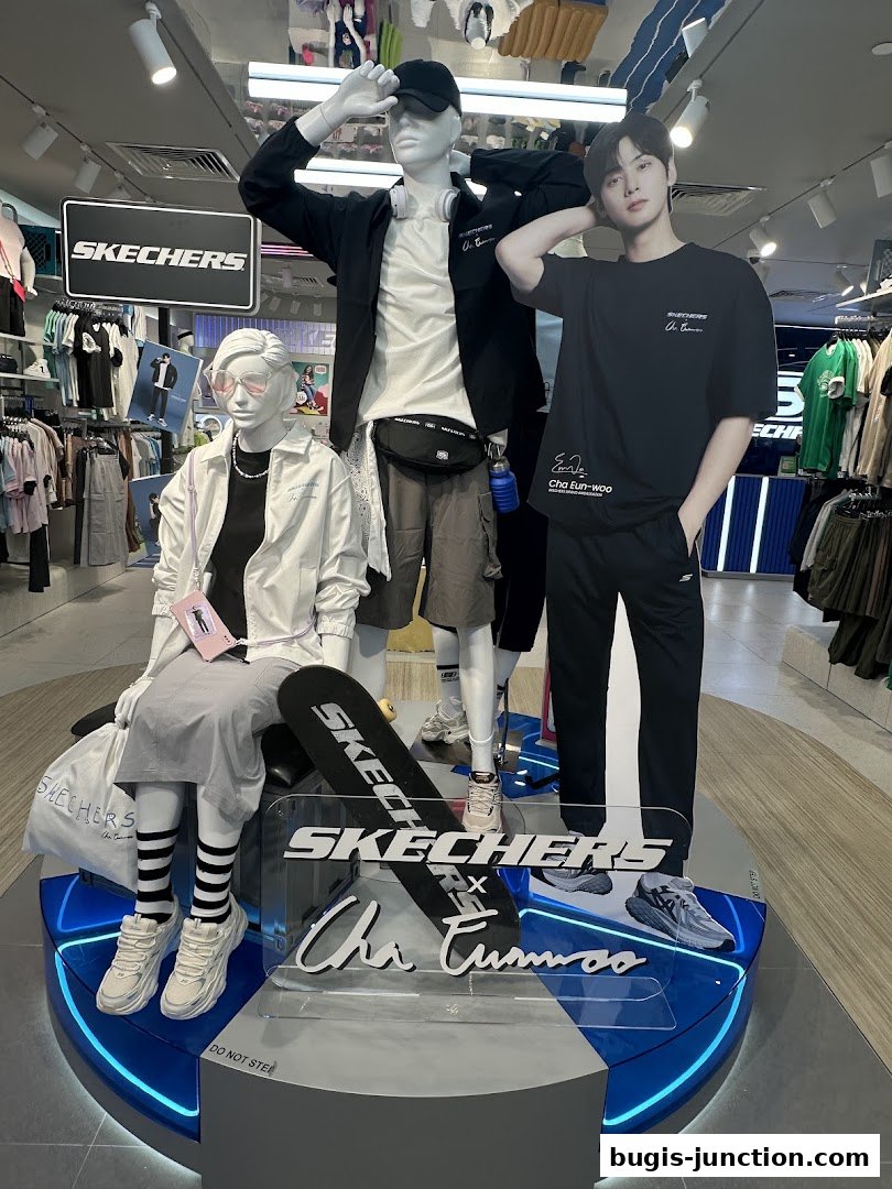 Skechers store display featuring mannequins and a cutout of Cha Eun-woo.