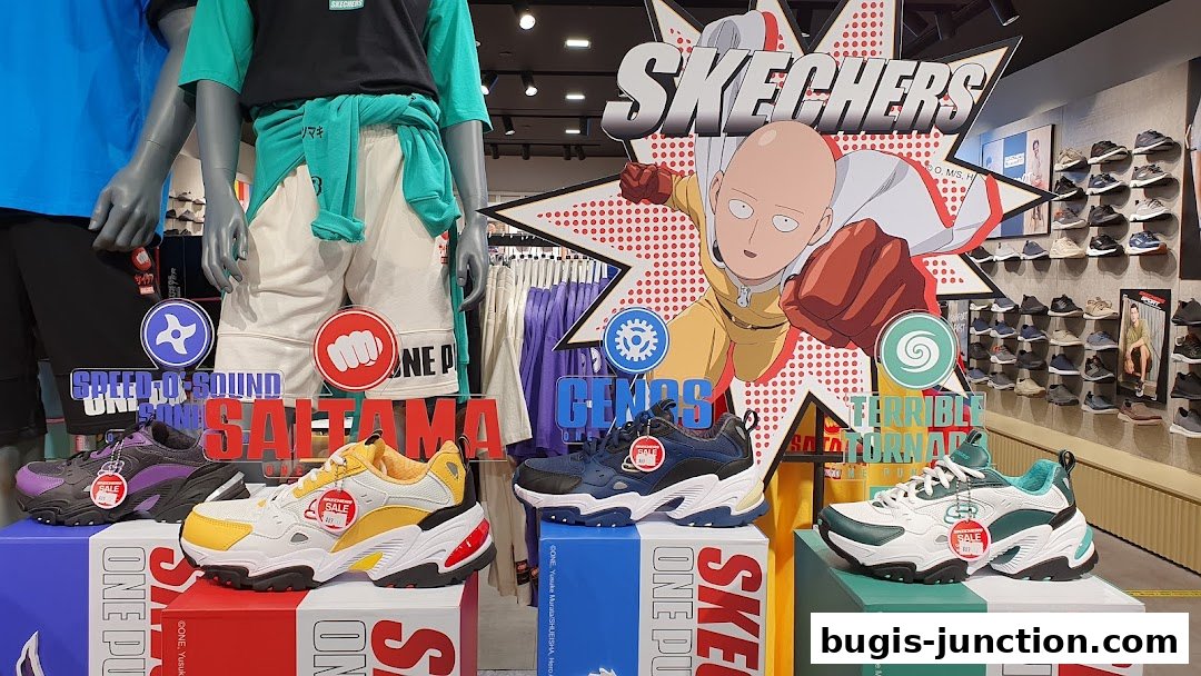 Skechers store display featuring One-Punch Man collaboration sneakers and apparel on mannequins.
