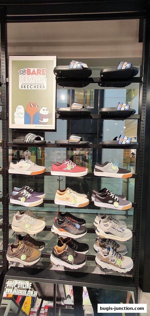 A display of Skechers shoes and slides, including a 'We Bare Bears' collaboration.