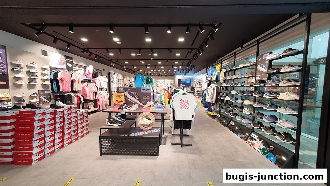 Interior view of a Skechers store showcasing a wide selection of shoes and apparel.