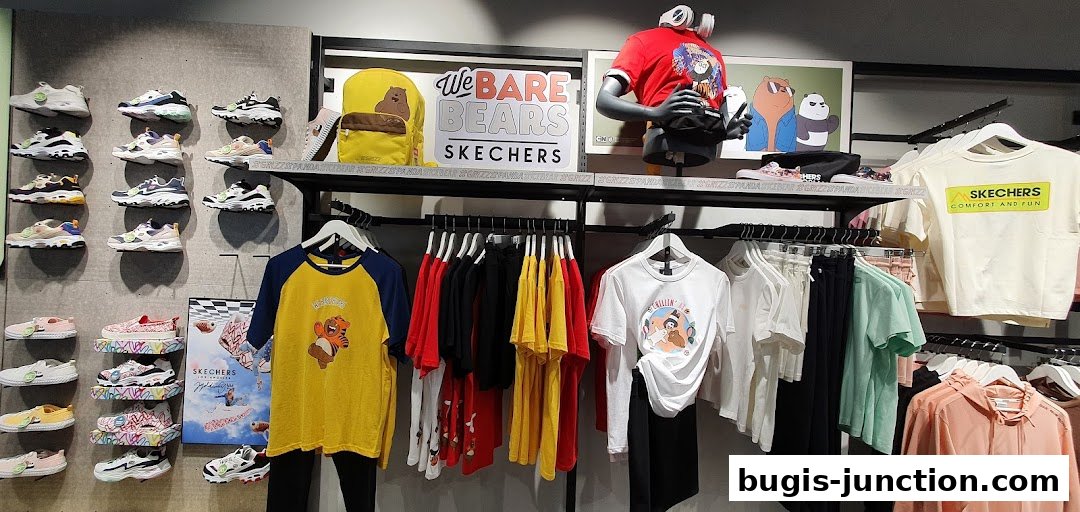 Skechers store interior showcasing a variety of shoes, apparel, and accessories, including a 'We Bare Bears' collection.