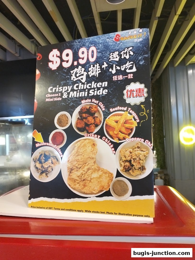 A menu board advertising a $9.90 deal for crispy chicken with a choice of mini side.