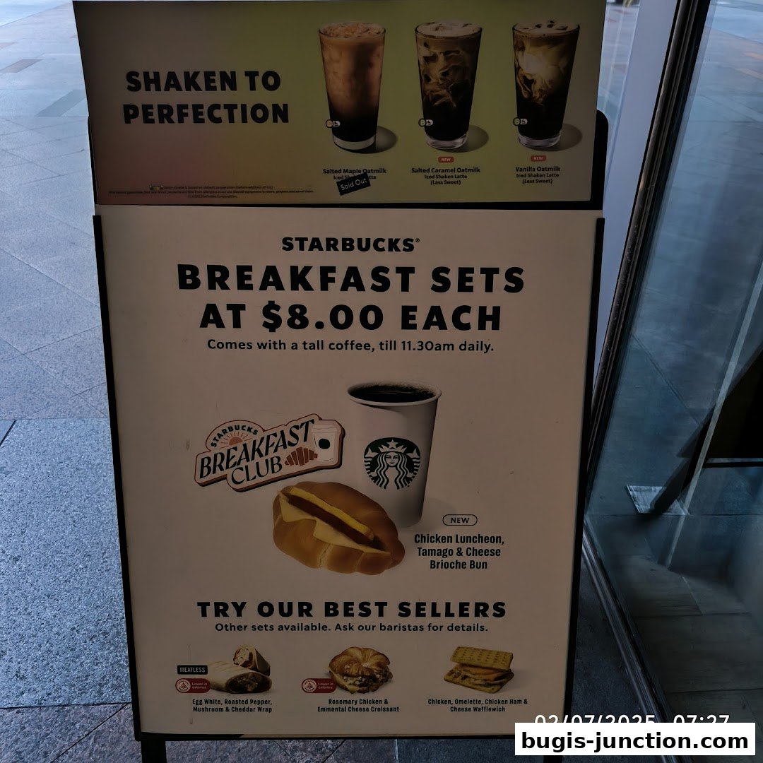 Starbucks promotional board showcasing breakfast sets and best-selling items.