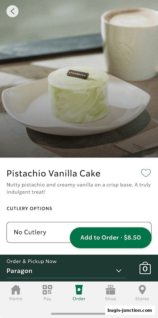 A delicious Pistachio Vanilla Cake from Starbucks with a cup of coffee.