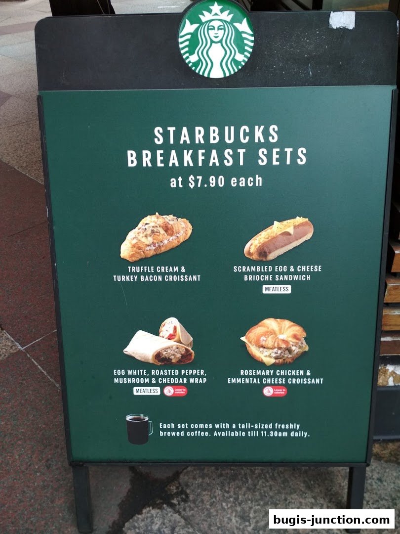 Starbucks breakfast sets menu featuring croissants, sandwiches, and wraps with coffee.
