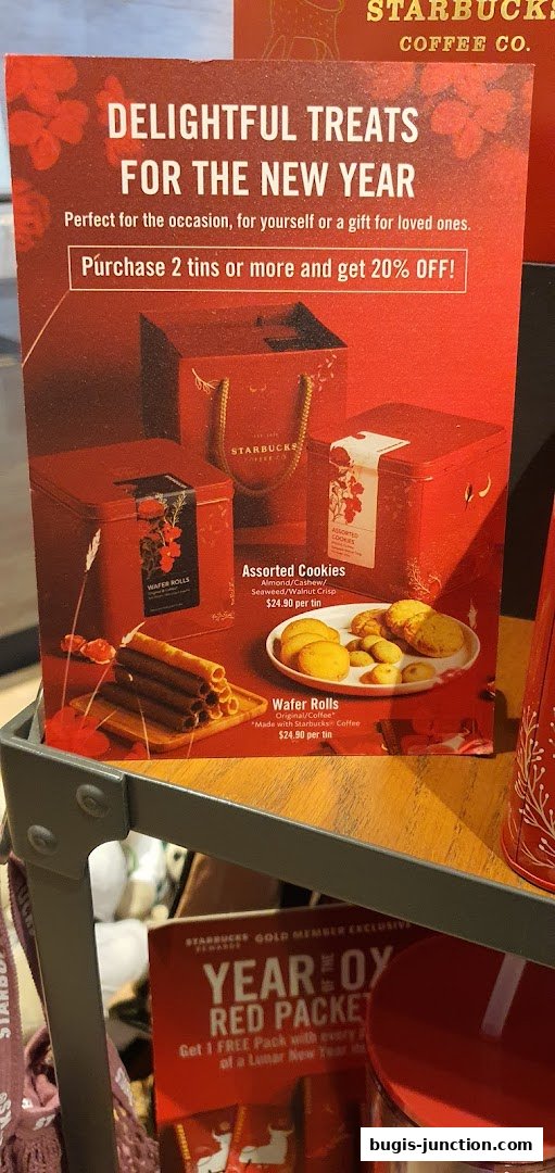 Starbucks promotion for New Year treats, featuring cookies and wafer rolls with a discount.