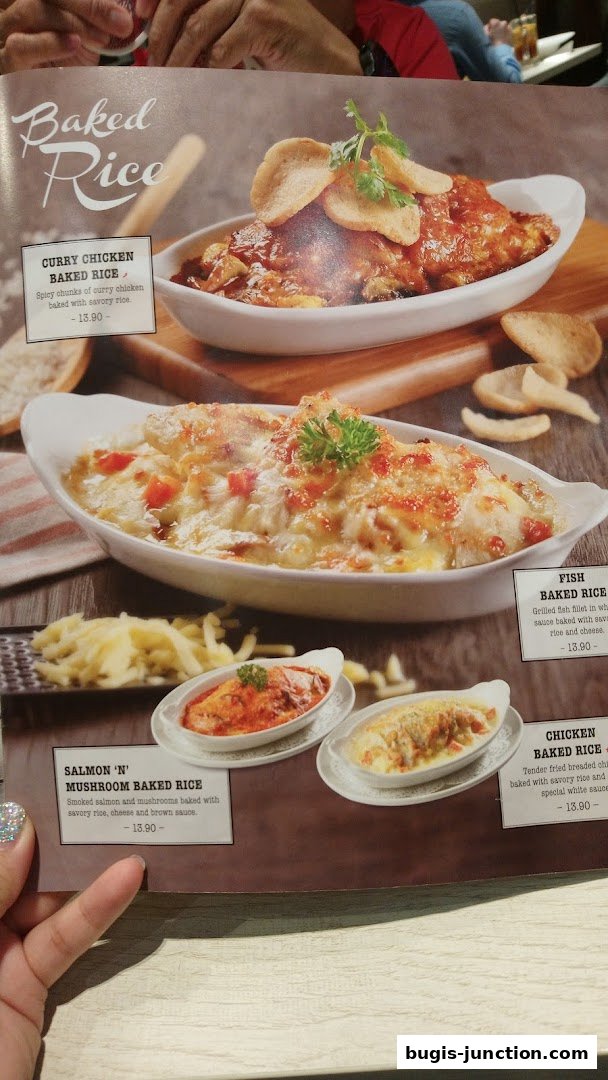 A menu page showcasing various baked rice dishes with appetizing descriptions and prices.