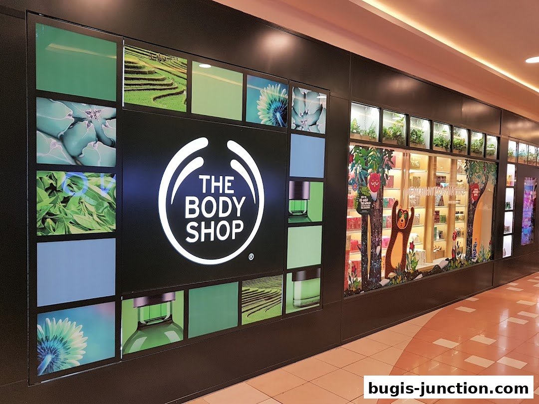 The Body Shop storefront with its logo and nature-themed window displays.