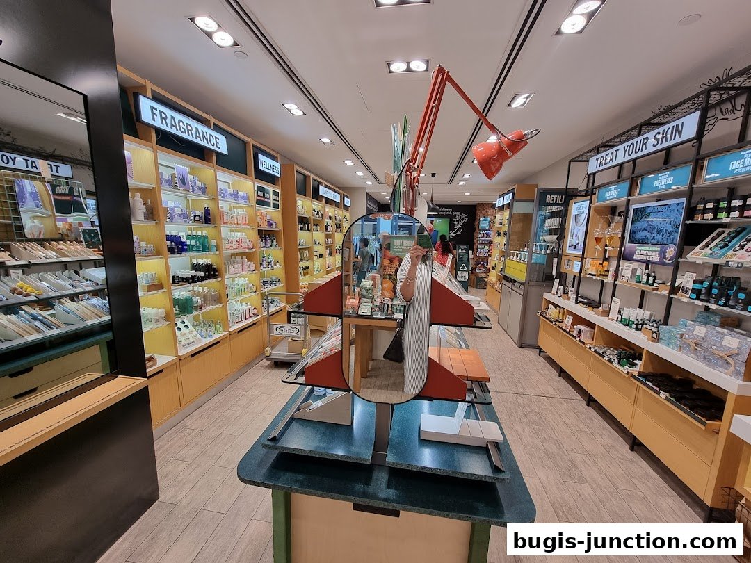 Interior view of The Body Shop store showcasing shelves stocked with skincare and fragrance products.