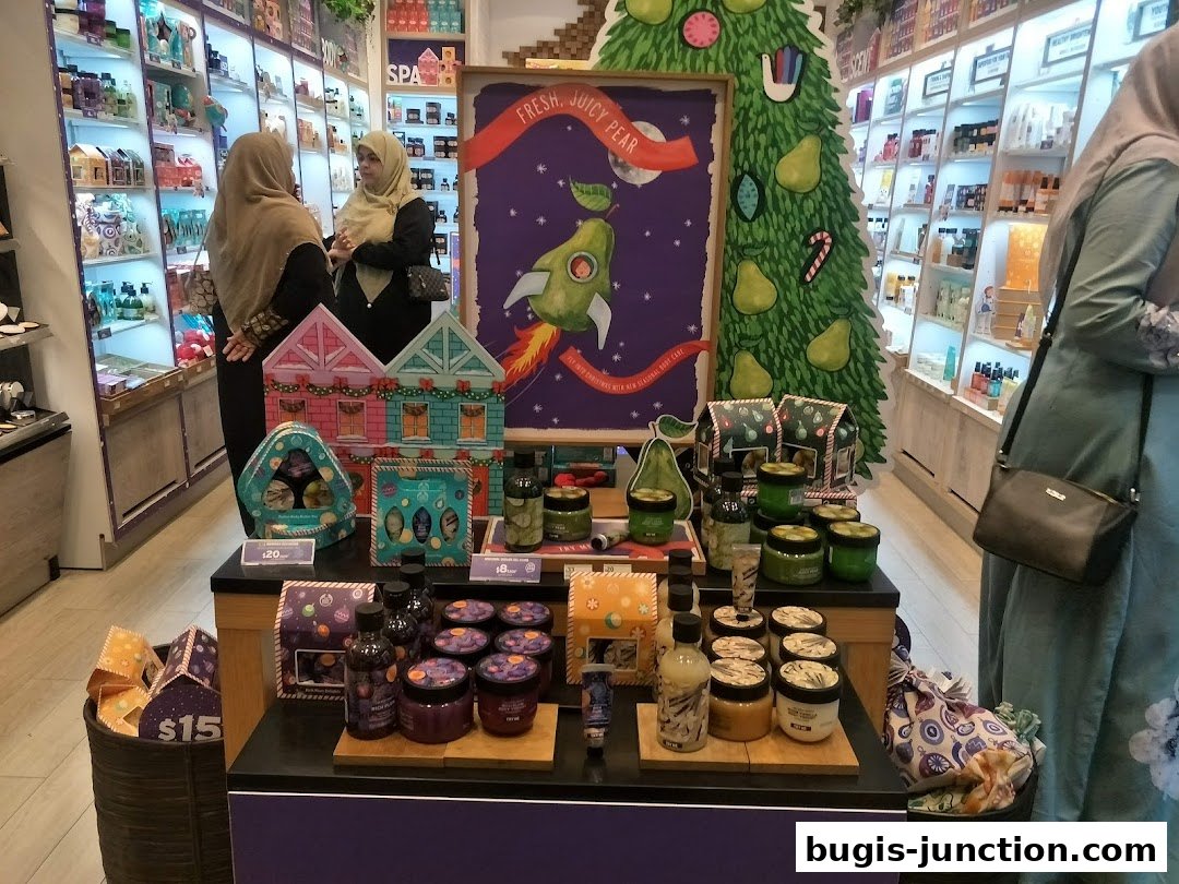 Interior view of The Body Shop with products displayed and customers browsing.