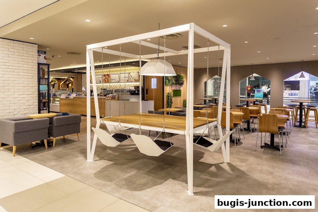 Interior of The Coffee Bean and Tea Leaf with unique swing seating and cafe tables.
