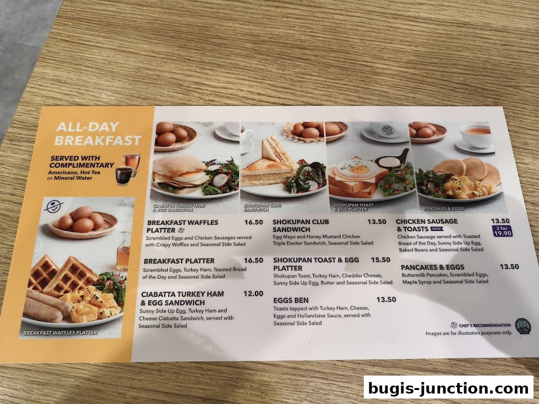 A menu showcasing all-day breakfast items with enticing food photography.