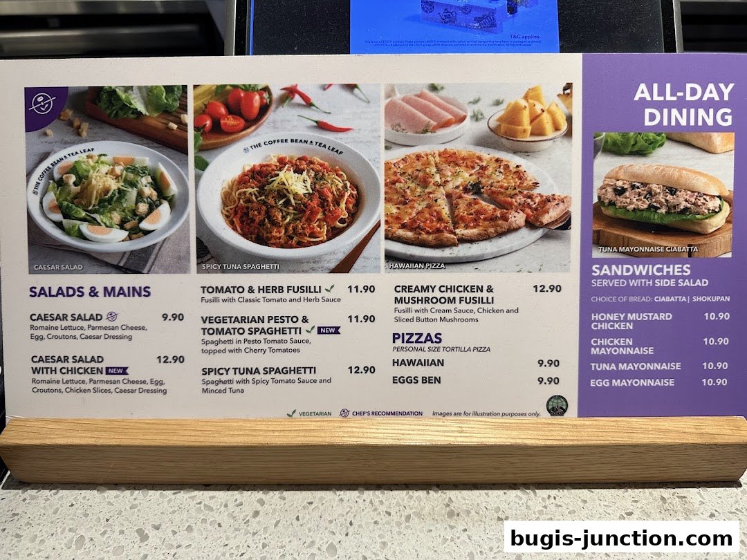 A menu from The Coffee Bean and Tea Leaf showcasing salads, pasta, pizza, and sandwiches.