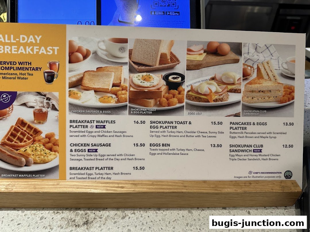 A menu display showcasing various all-day breakfast options with enticing food photography.