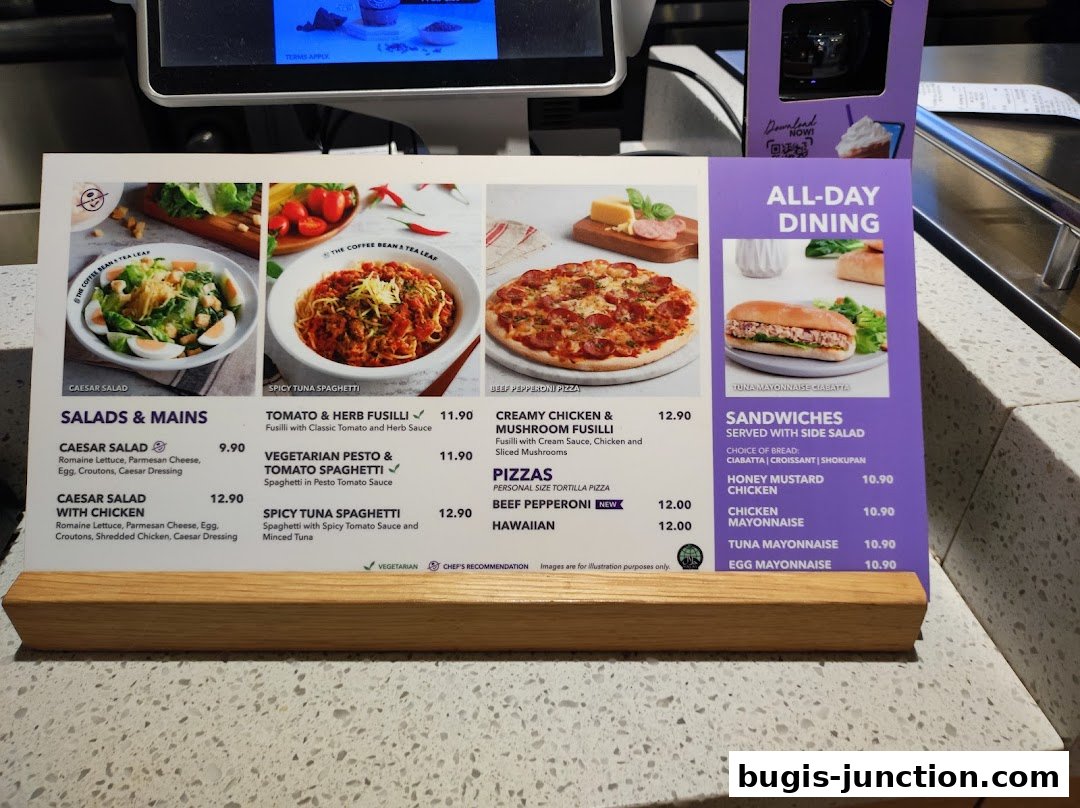 A menu board displaying salads, pasta, pizza, and sandwiches with prices.