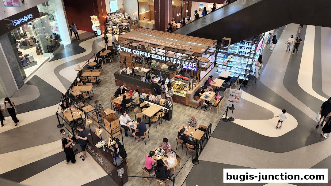An aerial view of The Coffee Bean & Tea Leaf cafe with customers seated at tables.