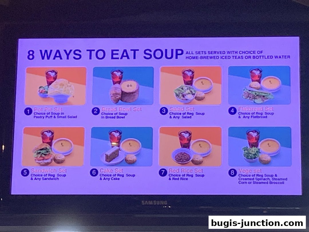 A menu board displaying 8 different soup sets with accompanying items and drinks.