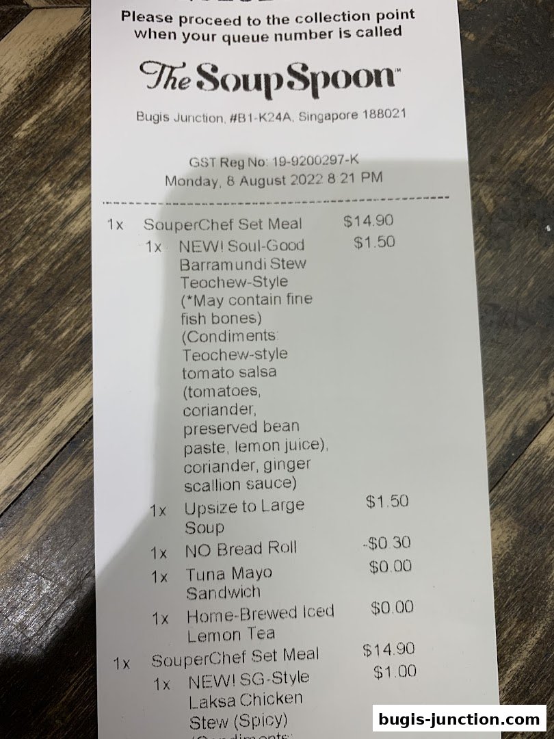 A receipt from The Soup Spoon showing various soup and meal items with prices.