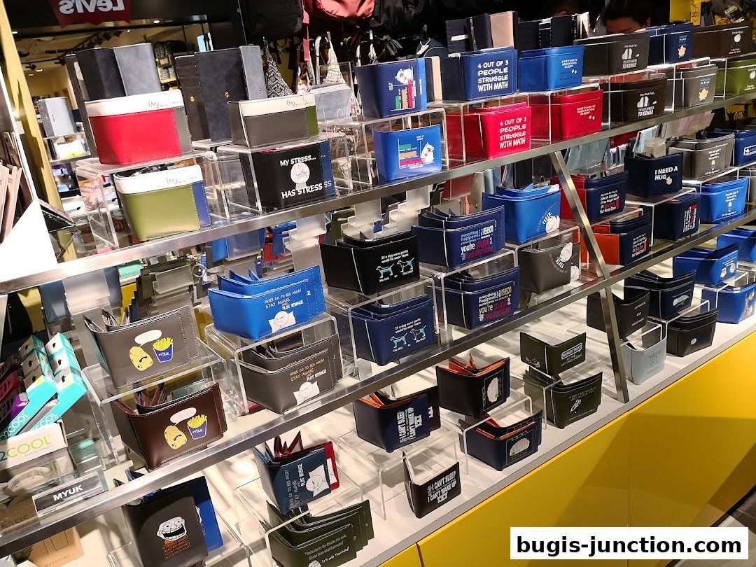 A display of various wallets with humorous and relatable text and graphics.