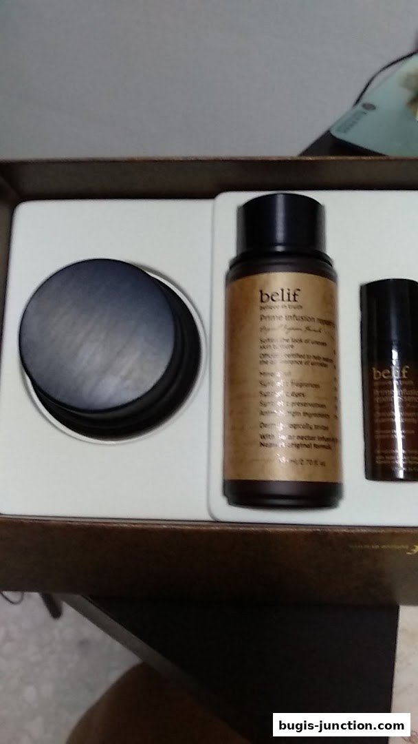 A set of Belif skincare products, including a jar and two bottles, displayed in a box.