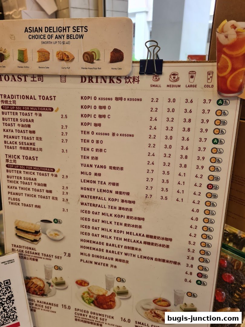 A menu board displaying various toast and drink options with prices and set meals.