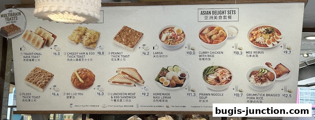 A menu board displaying various Asian delight sets and multigrain toasts with prices.