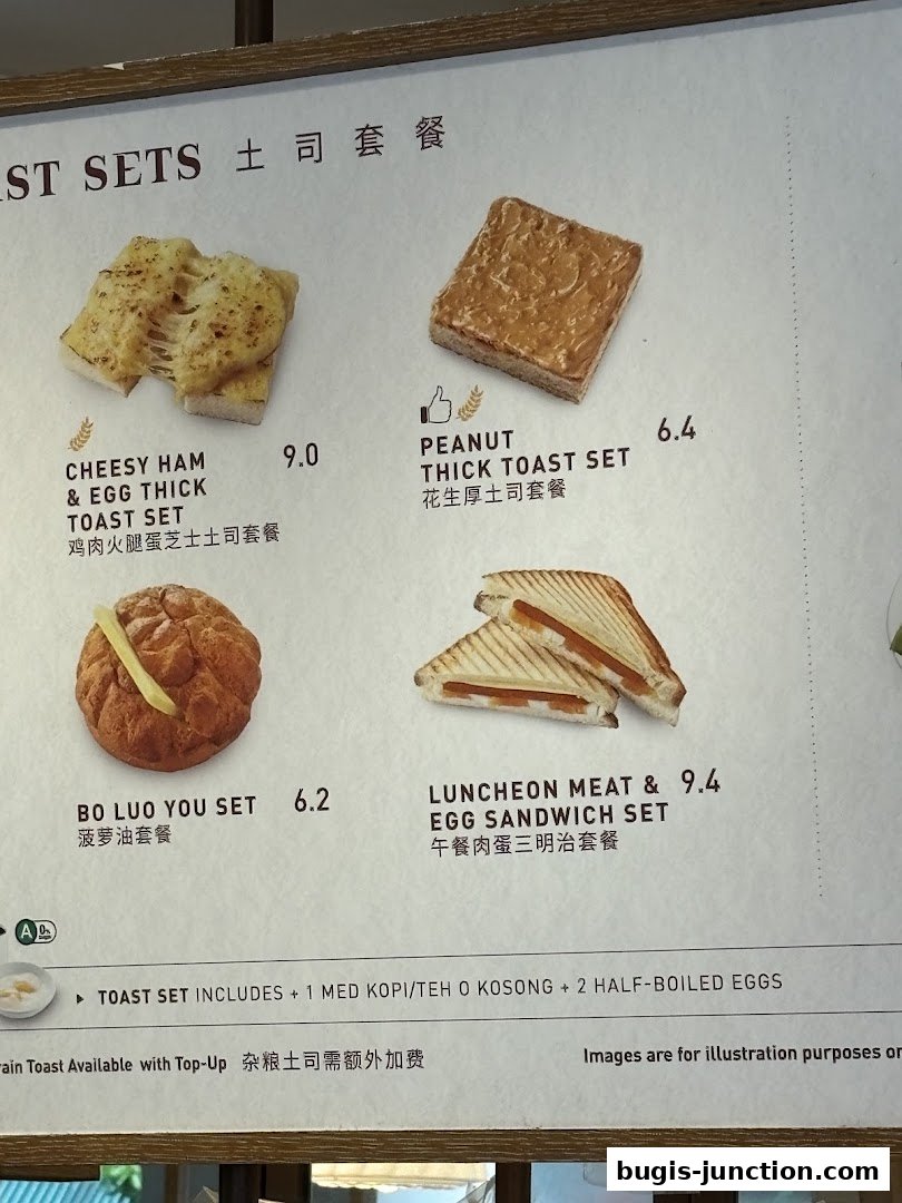 A menu board displaying various toast sets with images and prices.