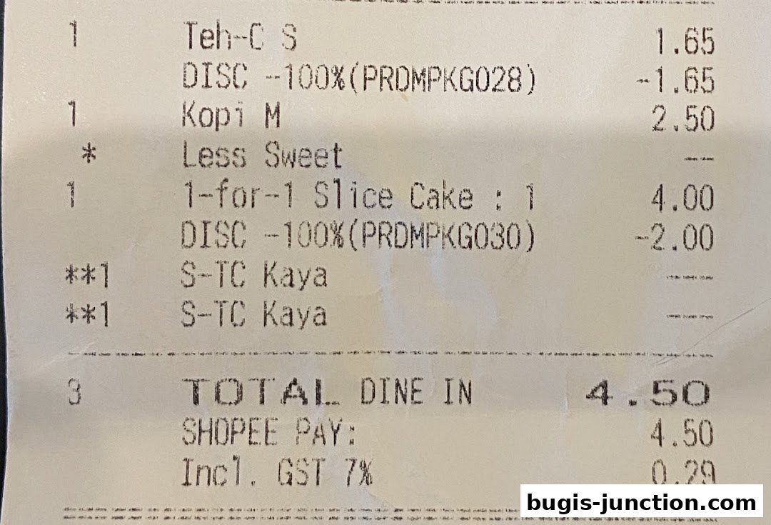 A receipt showing food and drink items purchased, including discounts and total cost.