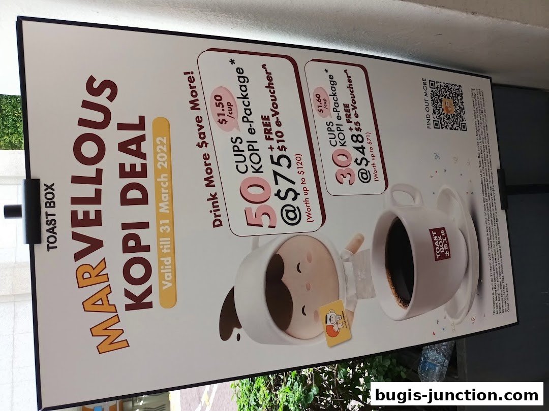 A promotional poster for Toast Box's Kopi deal, featuring two package options.