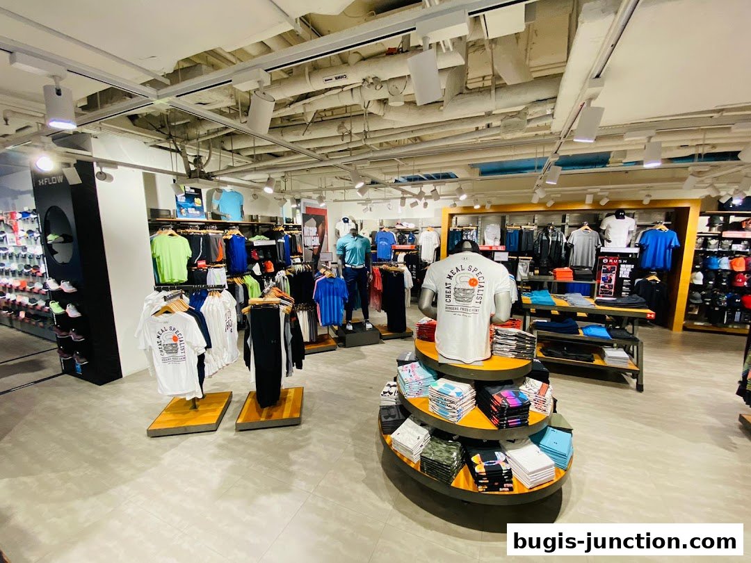 Interior view of an Under Armour store showcasing athletic apparel and footwear.