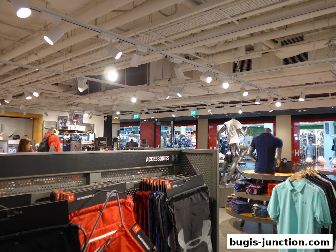Interior view of an Under Armour store showcasing athletic apparel and accessories.