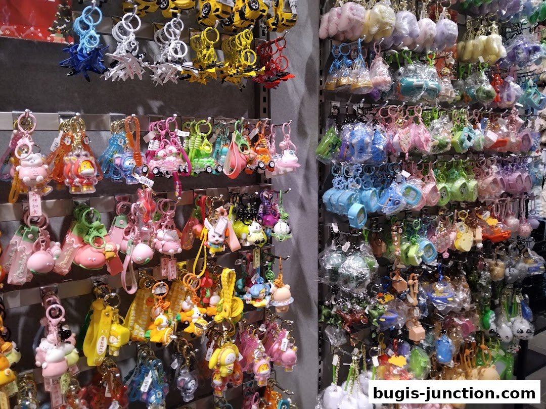 A wall display filled with a wide variety of colorful and cute keychains.