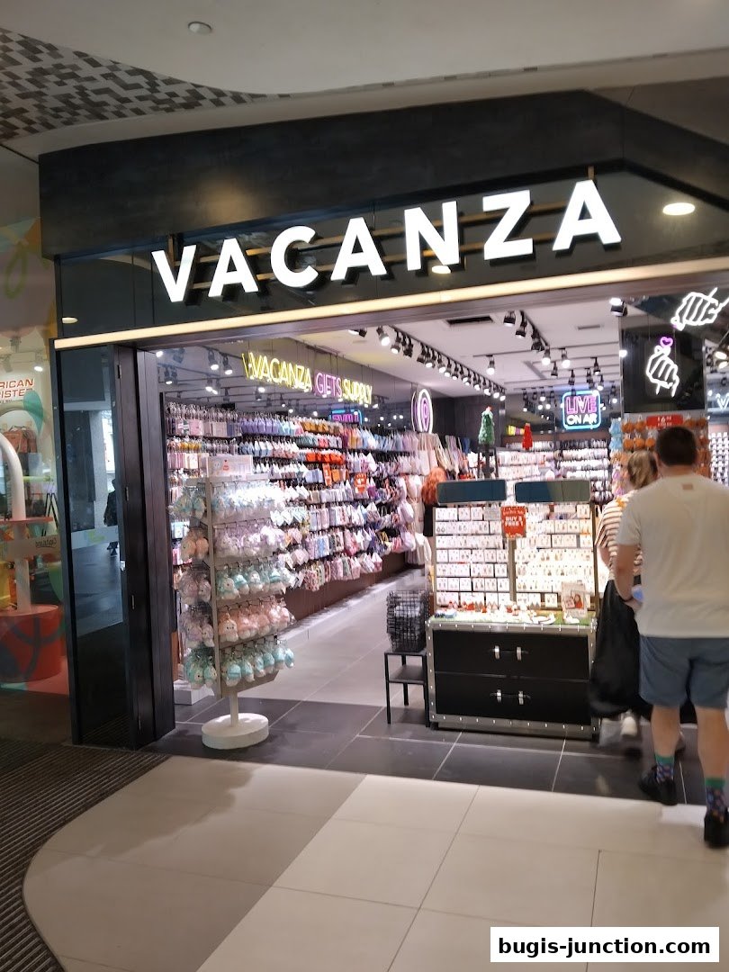 The Vacanza shop front displays a wide variety of colorful accessories and gifts.