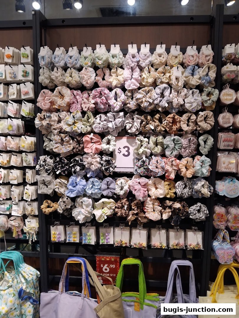 A wall display of colorful scrunchies and hair accessories at Vacanza.