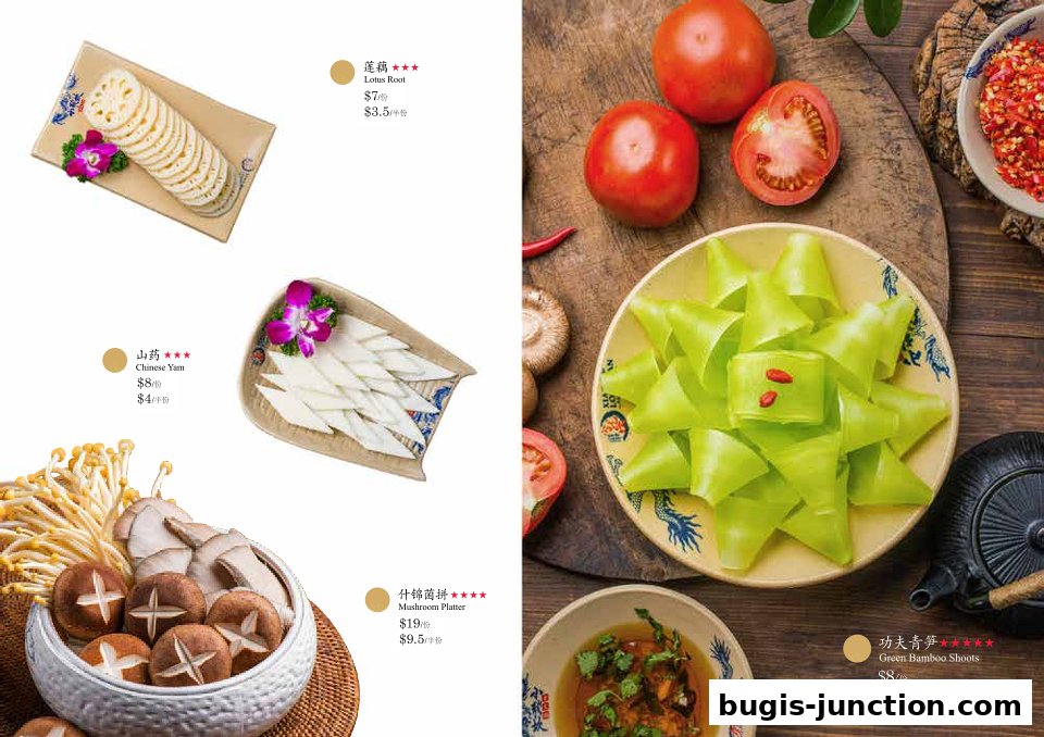 A spread of fresh ingredients and prepared dishes for hotpot dining.