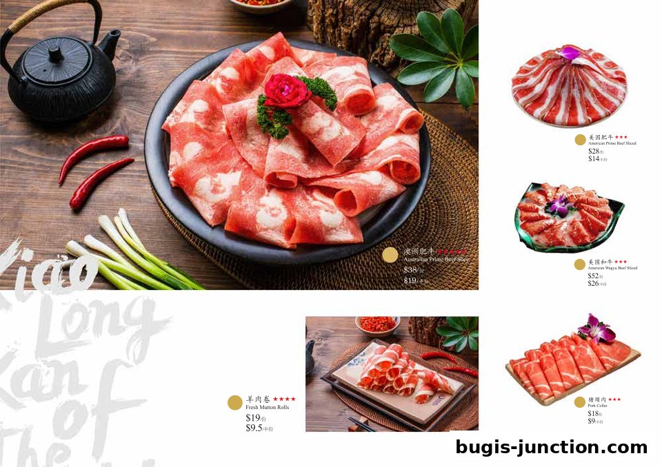 A spread of thinly sliced meats and ingredients for hotpot, presented artfully.