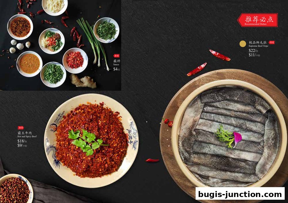 A spread of hotpot ingredients and dishes, including beef, tripe, and various dipping sauces.