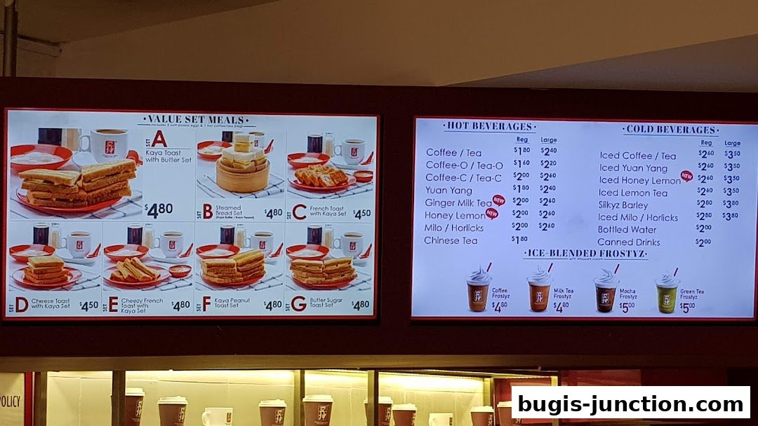 A menu board displaying value set meals, hot and cold beverages, and ice-blended drinks.