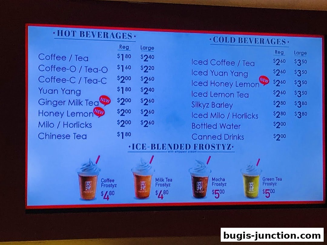 A menu board displaying hot beverages, cold beverages, and ice-blended drinks with prices.
