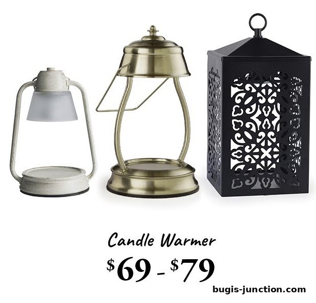 Three decorative candle warmers in white, brass, and black finishes.
