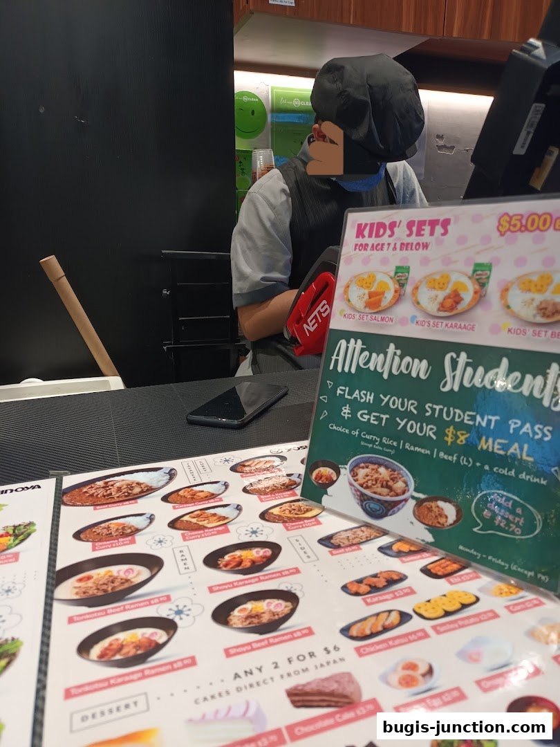 A Yoshinoya menu featuring kids' sets, student deals, and various Japanese dishes.