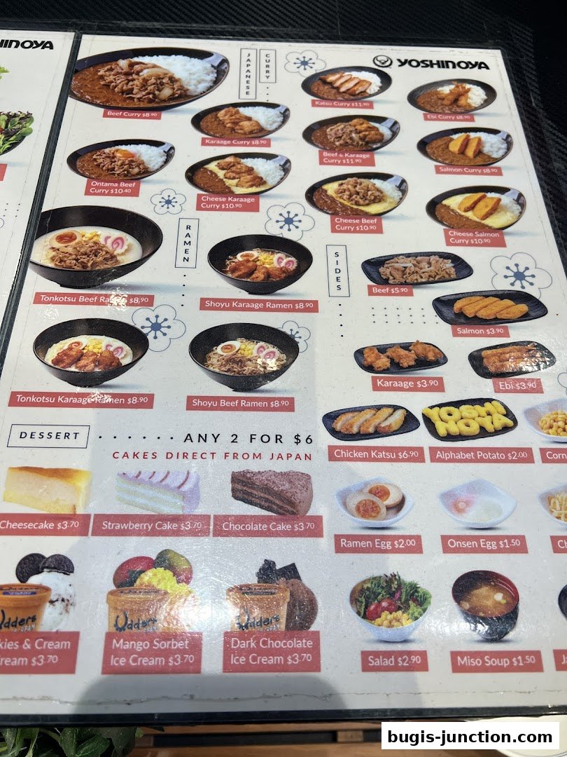 A menu from Yoshinoya featuring Japanese curry, ramen, sides, and desserts.