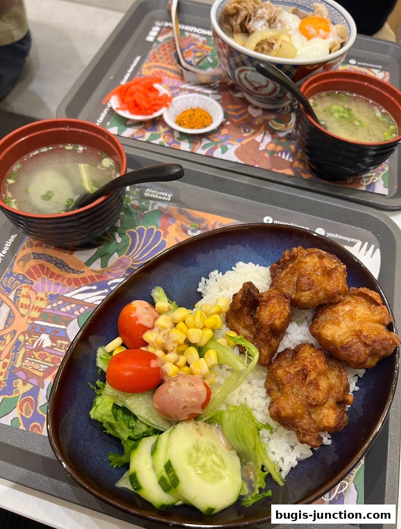 Two Yoshinoya meals featuring rice bowls, soup, and side dishes.