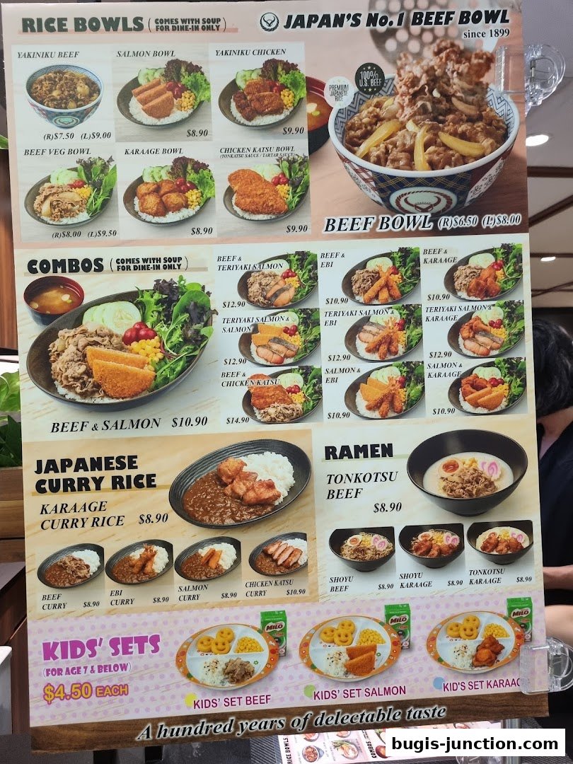 A menu board displaying various Japanese rice bowls, combos, curry rice, ramen, and kids' sets.